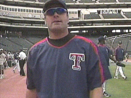 Kenny Rogers coming towards a camera man